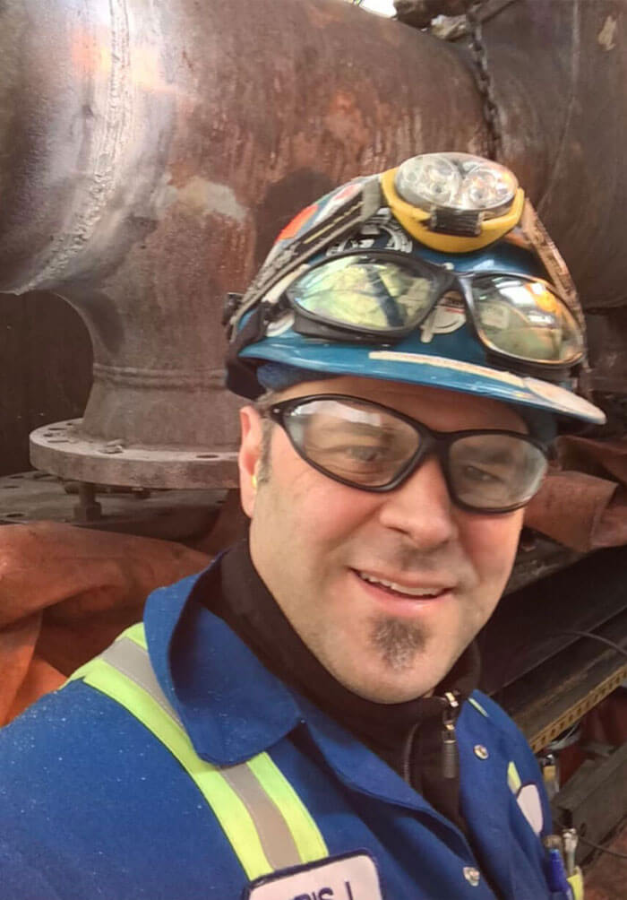 cj levesque happy smiling blue collar worker selfie ppe safety workplace industrial